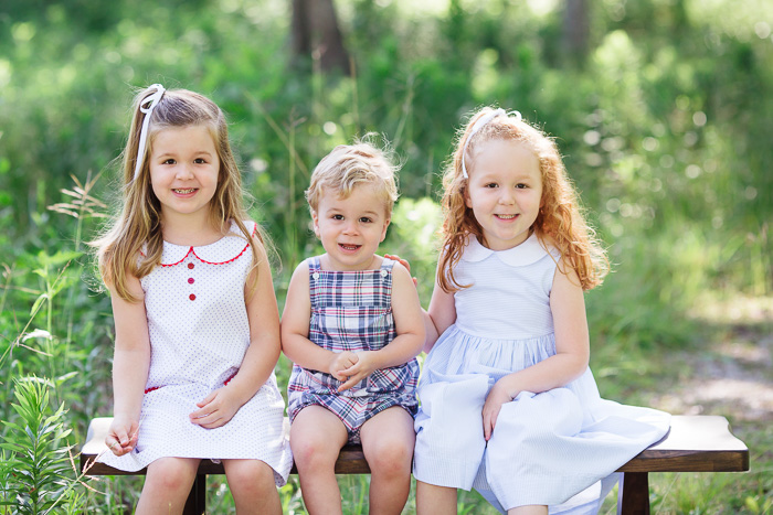 houston family photographer, houston family photography, memorial park houston, family, sisters, color, blue dresses, kelli nicole photography, red head, family of five, bench, three siblings, two sisters and one brother
