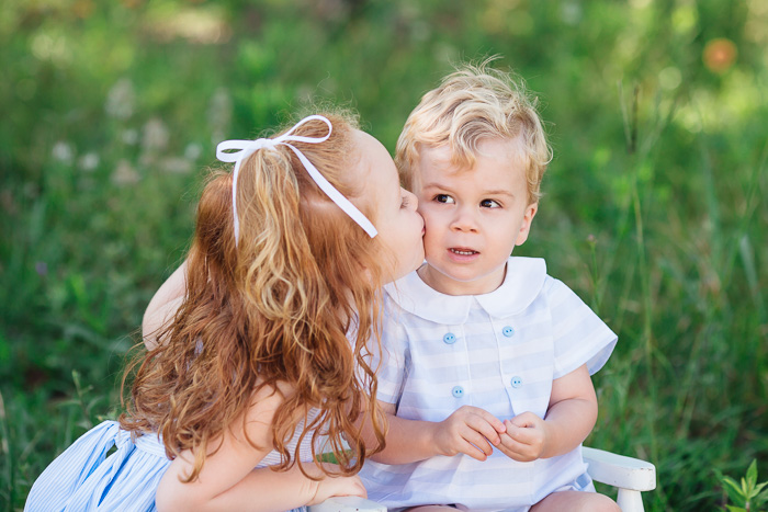 houston family photographer, houston family photography, memorial park houston, family, sisters, color, blue dresses, kelli nicole photography, red head, family of five, sister kissing baby brother,