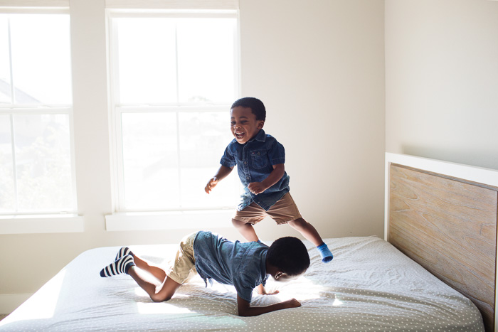 houston lifestyle photography, family photography, family photo shoot at home, black family, nigerian family, african family, children, child, brothers, kelli nicole photography, kelli nicole, jumping on the bed